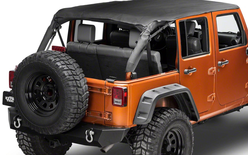 orange jeep with soft top