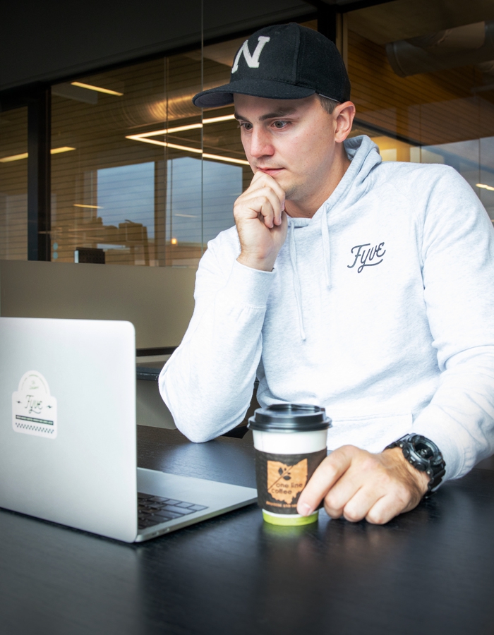 man looking on computer for a social media agency in columbus ohio